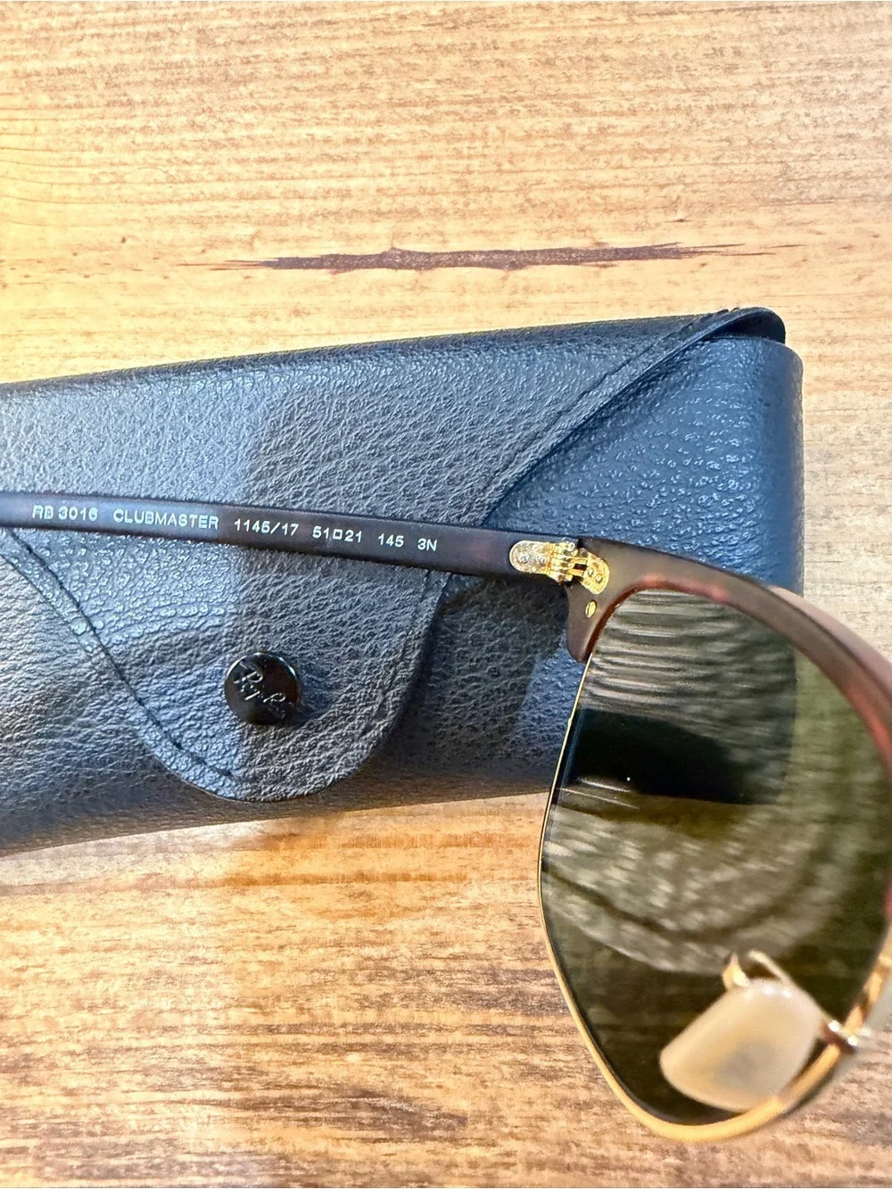 Ray-Ban Clubmaster Sunglasses with Tortoiseshell Frame and Blue Lenses